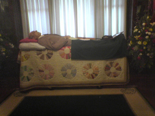 On handmade quilt by Fay Dowling