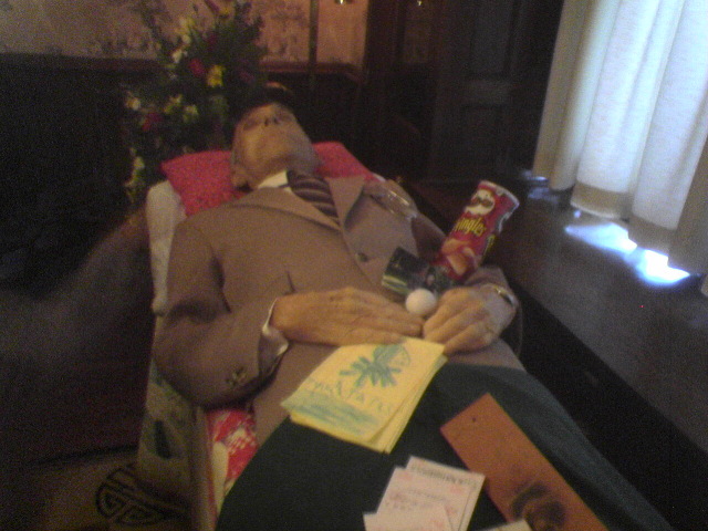 With remembrances, including golf ball & Pringles can